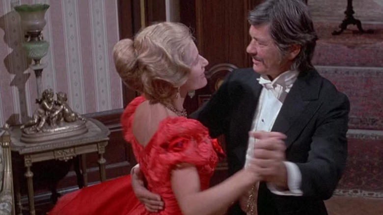 Jill Ireland as Amanda and Charles Bronson as Graham, dancing in From Noon til Three