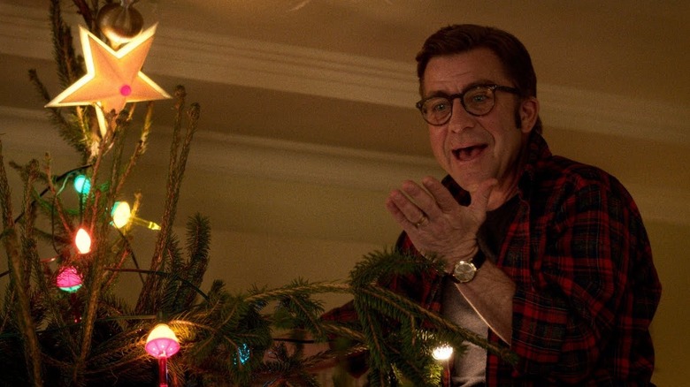 Peter Billingsley as Ralphie Parker, decorating a Christmas in A Christmas Story Christmas