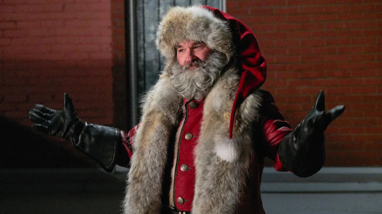 Kurt Russell as Santa Claus, arms extended in The Christmas Chronicles