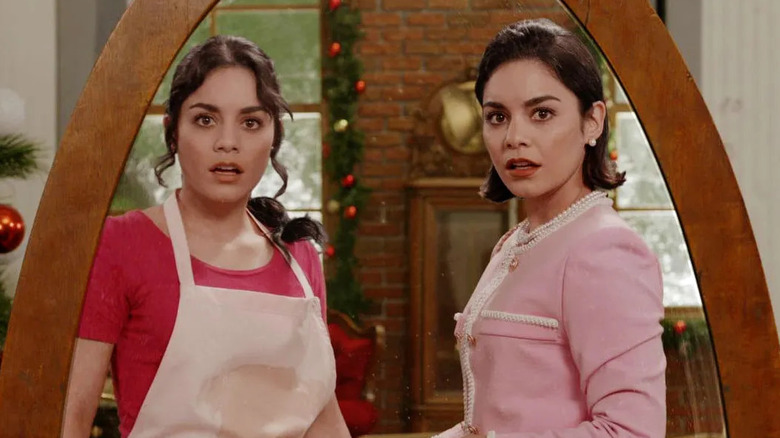 Vanessa Hudgens as Stacy and Margaret, looking in the mirror in The Princess Switch