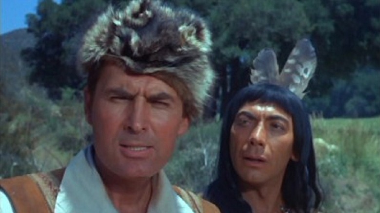Daniel Boone (Fess Parker) and Mingo (Jeff Ames) stare into the distance in Daniel Boone (1964)