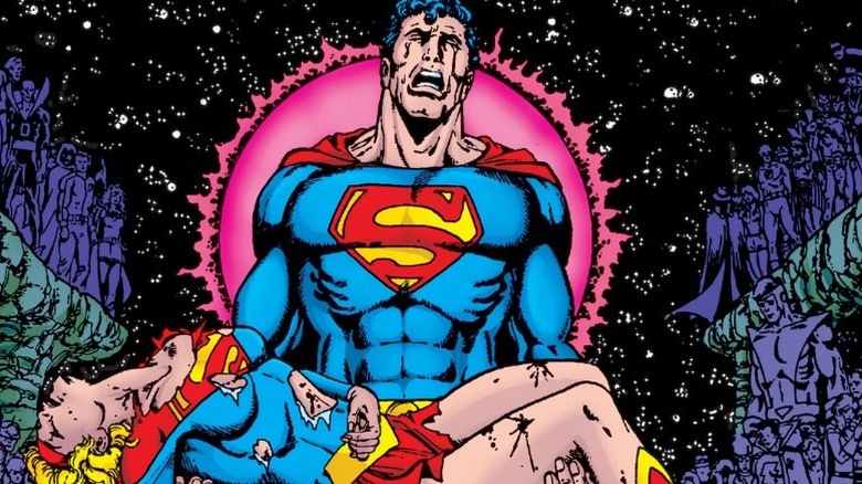 Superman crying while holding Supergirl in Crisis on Infinite Earths