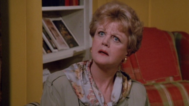Jessica Fletcher (Angela Lansbury) stares up in disbelief in Murder, She Wrote