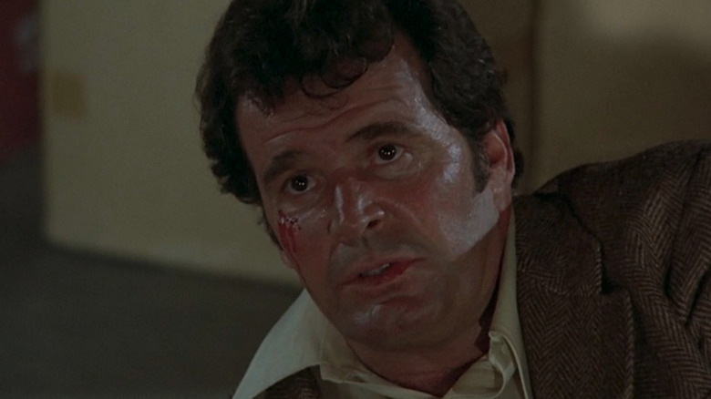 A nonplussed Jim Rockford (James Garner) with a cut on his face in The Rockford Files