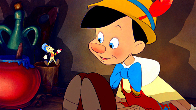 Jiminy Cricket introduces himself to Pinocchio as his conscience in Pinocchio