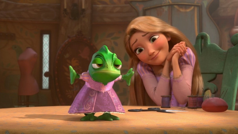 Pascal models a hand-sewn dress made by Rapunzel in Tangled