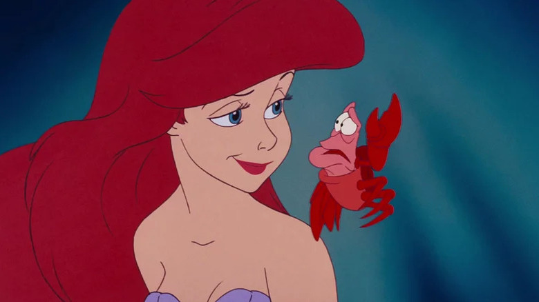 Ariel gives Sebastian the side eye in The Little Mermaid