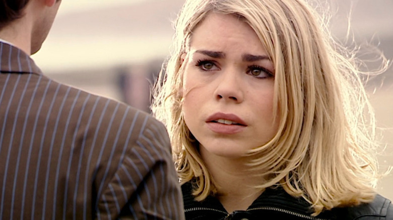 A distraught Rose Tyler (Billie Piper) looks at the Tenth Doctor (David Tennant) in Doctor Who