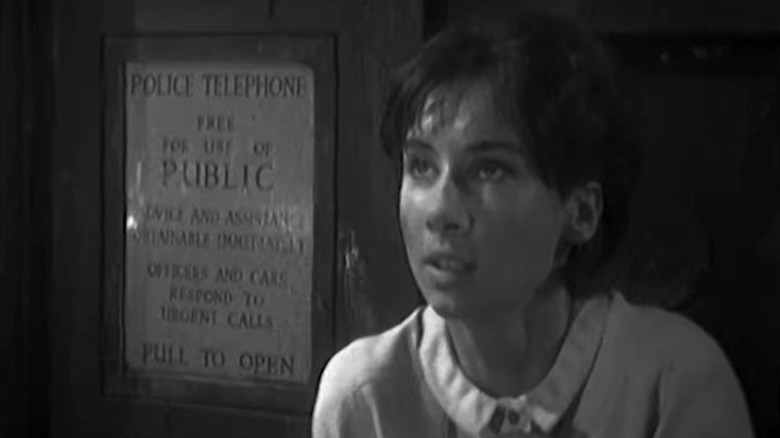 Susan Foreman (Carole Ann Ford) looks worried in front of the TARDIS in Doctor Who