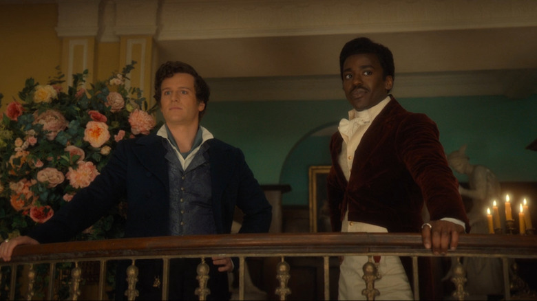 Rogue (Jonathan Groff) and Fifteen (Ncuti Gatwa) looking over balcony in the Doctor Who episode Rogue