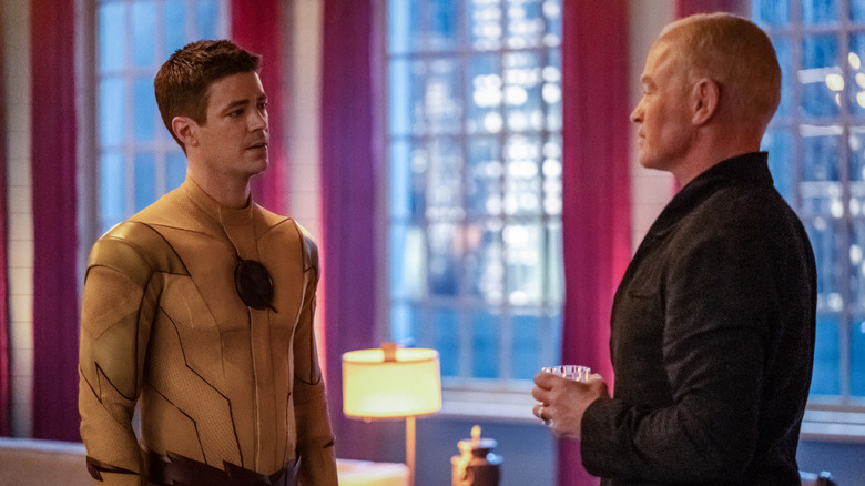 Grant Gustin and Neal McDonough as Barry Allen and Damien Darhk talking on The Flash