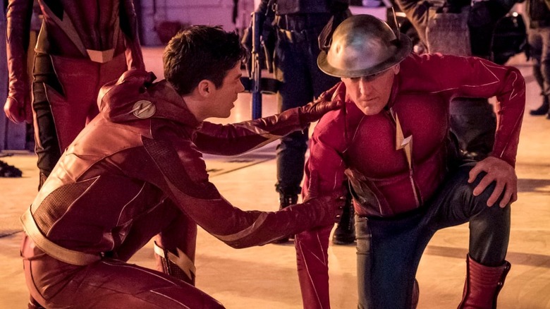 Grant Gustin and John Wesley Shipp as Barry Allen and Jay Garrick, supporting each other in Flashtime on The Flash