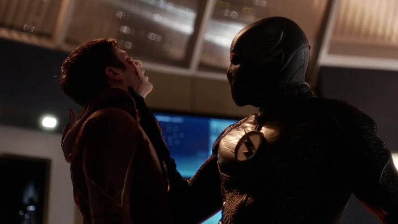 Zoom lifts Grant Gustin's Barry Allen off the ground on The Flash