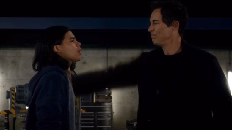 Carlos Valdes as Cisco Ramon, getting killed by Tom Cavanagh's Eobard Thawne on The Flash