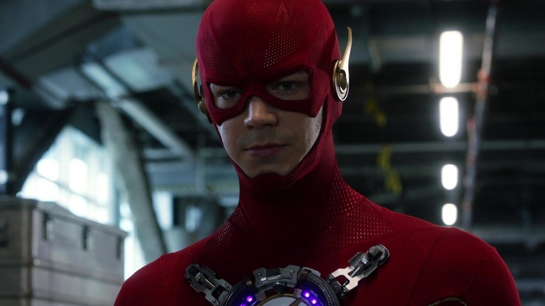 Grant Gustin as Barry Allen, wearing a device on his chest on The Flash