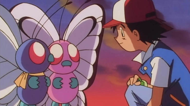 Ash's Butterfree wearing a scarf next to a pink Butterfree facing Ash on the original Pokemon series