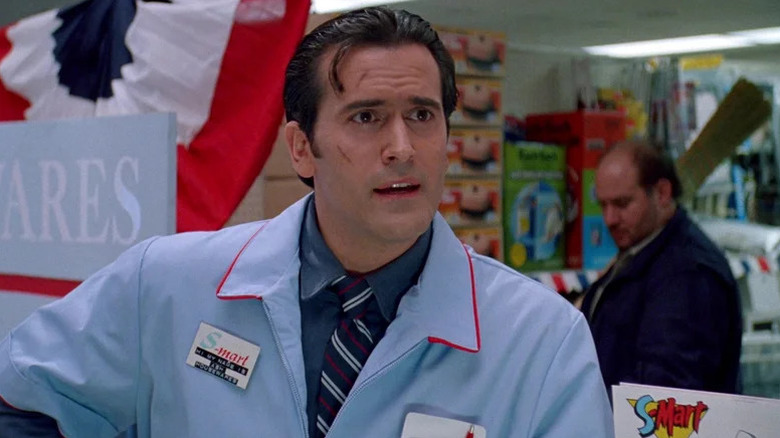 Ash Williams (Bruce Campbell) stands at a superstore in Army of Darkness