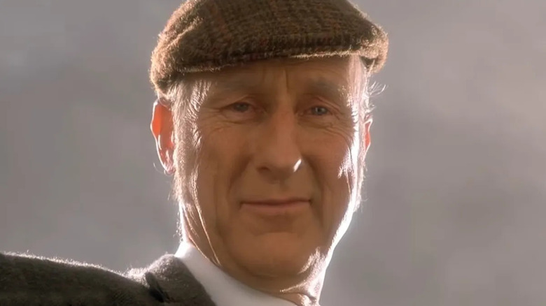 Arthur Hoggett (James Cromwell) smiles looking down in Babe