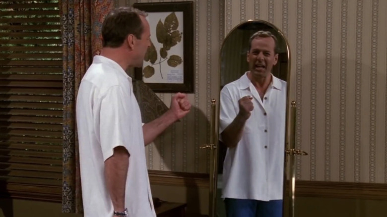 Bruce Willis as Paul Stevens looking in the mirror in the Friends episode "The One Where Paul's the Man"