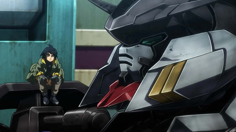 Mikasuki Augus sits on his Gundam in Mobile Suit Gundam: Iron-Blooded Orphans