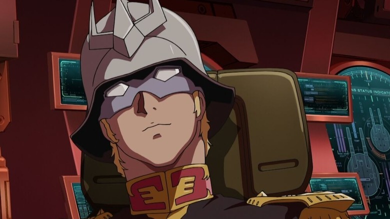 Char Aznable sits in his cockpit in Mobile Suit Gundam: The Origin
