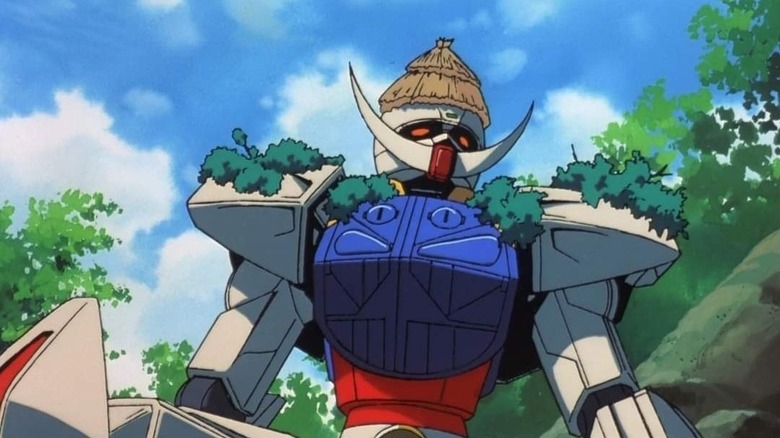 The Turn A Gundam with a roof and tree branches on its head and shoulders in Turn A Gundam