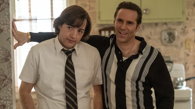 Michael Gandolfini and Alessandro Nivola as Tony Soprano and Dickie Moltisanti, standing in the Soprano kitchen in The Many Saints of Newark