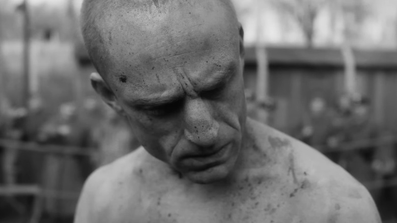 Ben Foster as Harry Haft, sullen in a boxing ring in The Survivor