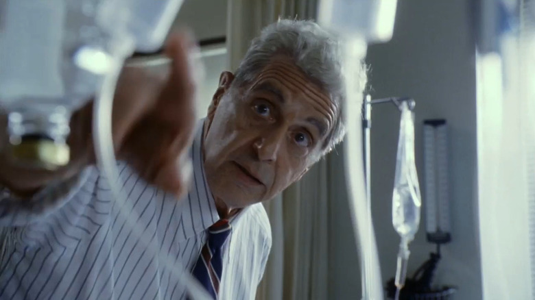 Al Pacino as Jack Kevorkian pointing to an IV drip in You Don't Know Jack