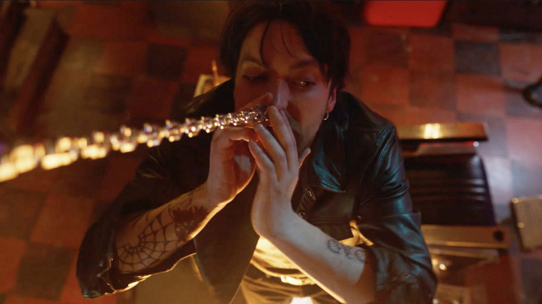 Richard Harmon as Erik trying not to get his septum ripped out in Final Destination: Bloodlines