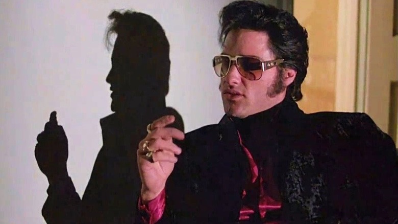 Kurt Russell as Elvis Presley casts a shadow in Elvis