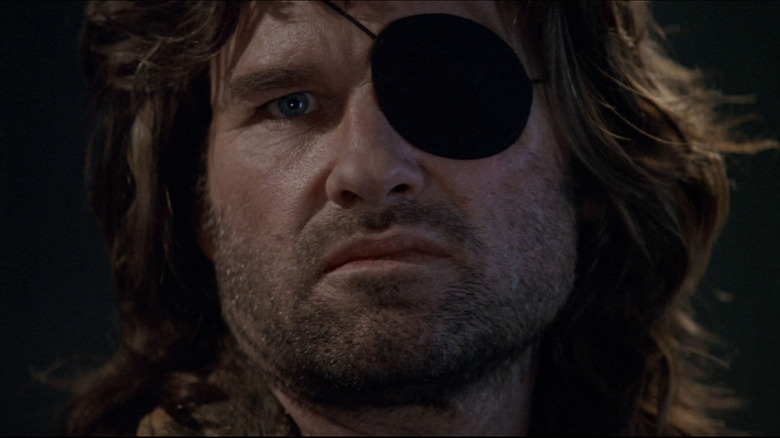 Kurt Russell as Snake Plissken in an intense close-up in Escape From New York