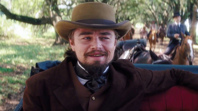 Mr. Candy smiling in Django Unchained