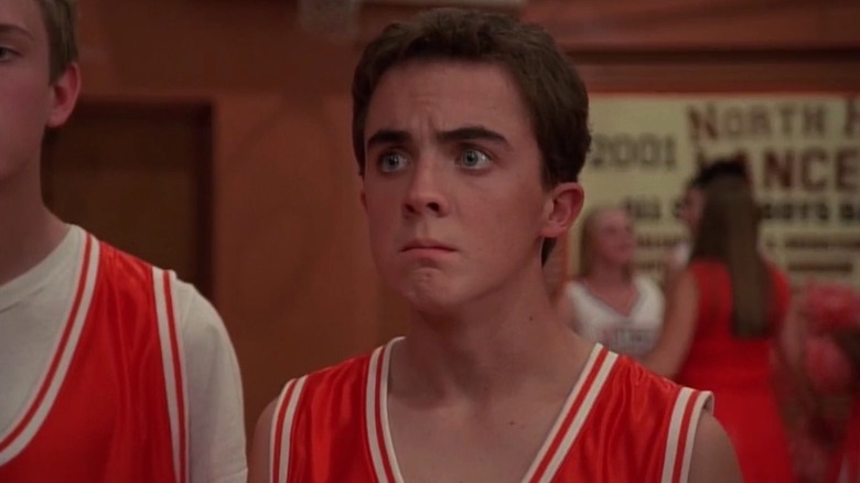 Malcolm (Frankie Muniz) staying silent on a basketball court on Malcolm in the Middle