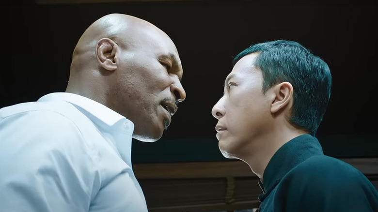 Frank (Mike Tyson) speaks tersely with Ip Man (Donnie Yen) in Ip Man 3