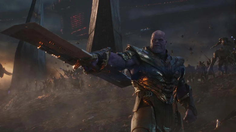 Josh Brolin as Thanos in Avengers: Endgame, wielding a large sword in front of his army.