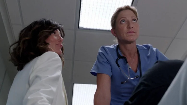 Eleanor O'Hara (Eve Best) smirks at a nonplussed Jackie Peyton (Edie Falco) in Nurse Jackie