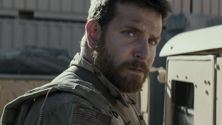 Bradley Cooper as Chris Kyle looks worried in American Sniper