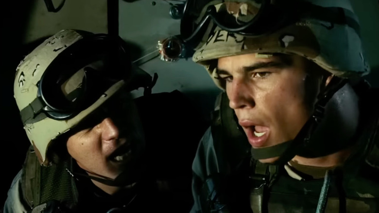 Ewan McGregor as SPC John Grimes shouts at Josh Hartnett as SSG Matt Eversmann in Black Hawk Down