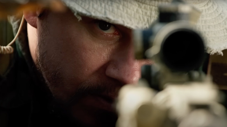 Mark Wahlberg as Hospital corpsman First Class Marcus Luttell takes aim in Lone Survivor