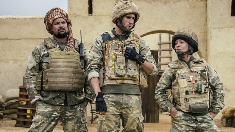 Faruq (Keeno Lee Hector), Nick (Oliver Chris), and Mary (Kelly Adams) talk next steps in Bluestone 42.
