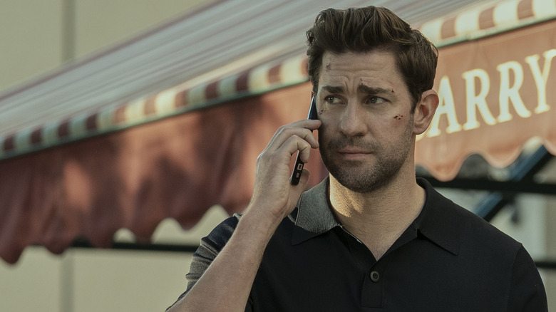 Jack Ryan (John Krasinski) takes a call in Jack Ryan.