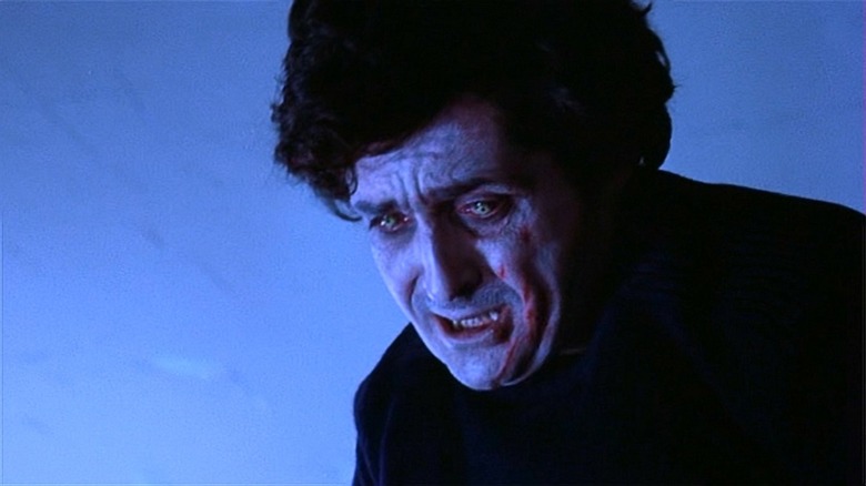 Father Karras (Jason Miller) struggles with Pazuzu in The Exorcist
