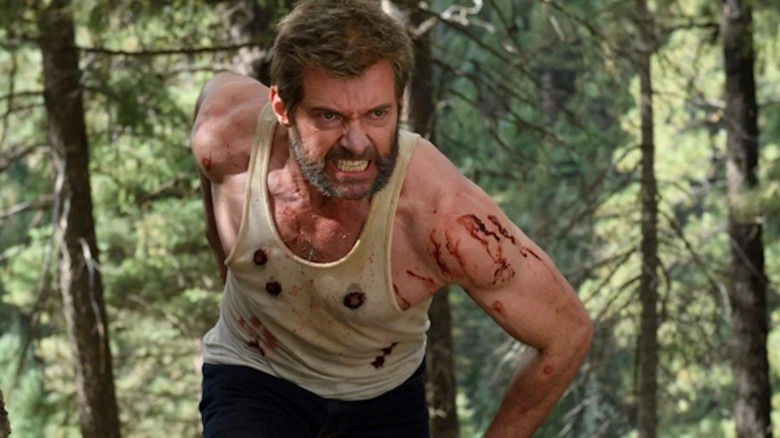 Logan (Hugh Jackman) pushes through the North Dakota woods in Logan