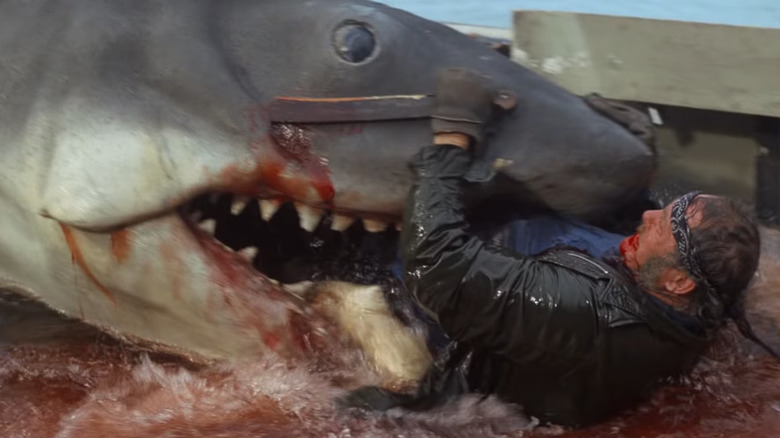 Quint (Robert Shaw) being eaten by the shark in Jaws