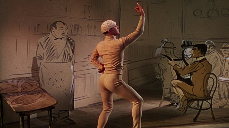 Gene Kelly as Jerry in An American In Paris, dressed in all white and posed in front of a set that looks like a sketch