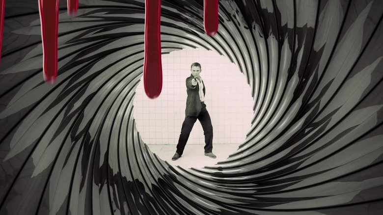 James Bond (Daniel Craig) shoots bad guy in Casino Royale (2006)