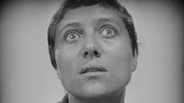Renée Jeanne Falconetti as Joan of Arc looking up with eyes widened in The Passion of Joan of Arc