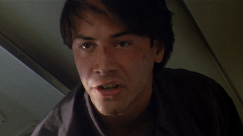 Johnny Utah (Keanu Reeves) in a plane in Point Break