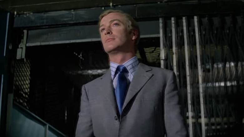 Charlie (Michael Caine) in doorway in 1969's The Italian Job